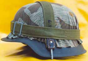 Son premier casque : un modèle 1942 allemand rapporté de la guerre par son père (gare de St Quentin -Aisne- 10.09.1944).